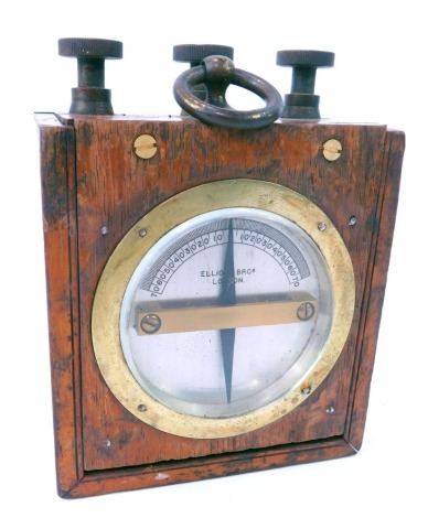 A 20thC Elliott Bros of London galvanometer, mahogany cased, the silvered dial with brass ring, in wooden case, with three turning dials, 13cm high, 9cm wide.