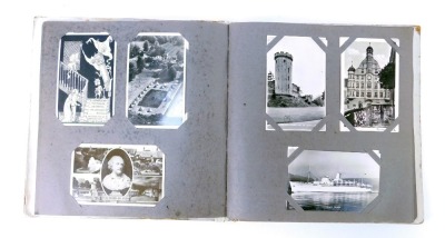 A late 20thC black and white postcard album, containing postcards relating to UK towns, to include Blackpool, HMS coloured postcards, etc. - 2