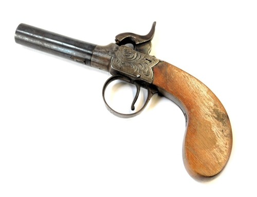 A 19thC percussion pistol, with boxlock, and walnut stock, 18cm long.