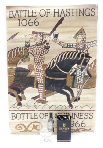 A Guinness 1966 poster, to commemorate 900 years of Battle of Hastings, 51cm x 75cm, together with a Guinness Genius half pint mug, box.