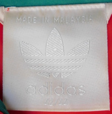 An Adidas Liverpool Football Club waterproof jacket, in red, green and white, with fabric badge, size 42 - 44. - 4