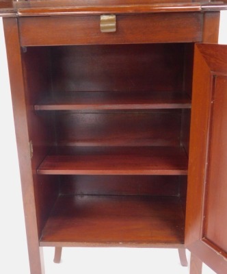 An Edwardian mahogany drinks cabinet, the hinged inlaid top with a moulded edge opening to reveal three recesses containing three cut glass decanters with lower drawer to each section, mirror to underside of lid, two hinged doors to front of cabinet conta - 3