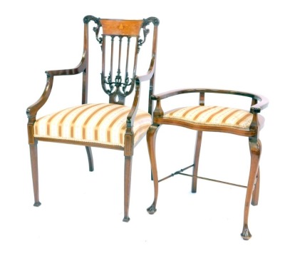 A late 19thC open armchair in the Sheraton style, with an inlaid pierced scroll carved back, boxwood line inlaid arms, Regency stripe overstuffed seat raised on square tapering legs and out splayed feet, together with an Edwardian mahogany stool, with cur