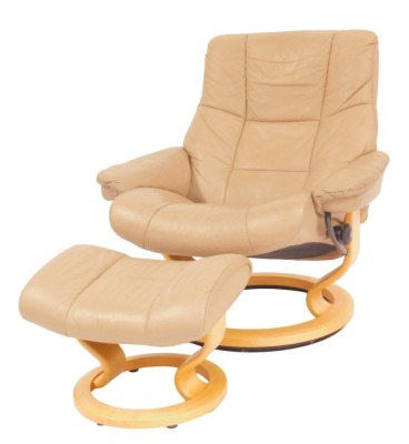 A Stressless reclining armchair, in taupe leather upholstery, on a beech circular base, together with a matching footstool.