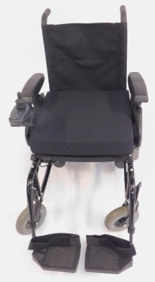 A Sunrise Medical Powertec F40 mobility chair, model number F40VR, with instruction manual and charging cable. - 2