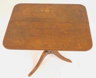 A 19thC oak tilt top table, the rectangular top with a rounded edge, on turned column terminating in three outswept legs, 73cm high, the top 52cm x 70cm. - 2