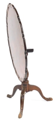 A George III mahogany tilt top, with a later dished piecrust top, raised on a leaf carved baluster column over three leaf carved cabriole legs terminating in ball and claw feet, 70.5cm high, 89cm diameter. - 3