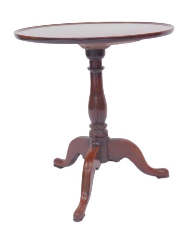 A 19thC mahogany tripod table, the circular dished top, on a turned column, on pad feet, 68cm high, the top 63cm diameter.