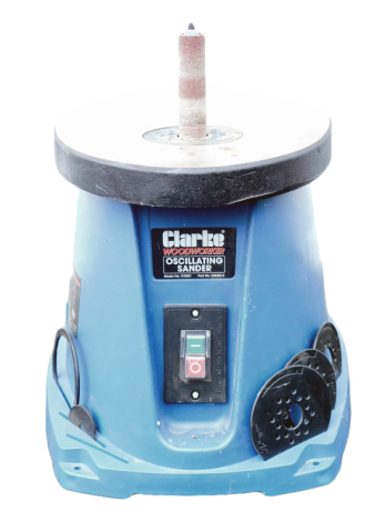 A Clarke Woodworker electric oscillating sander, model number CO851.