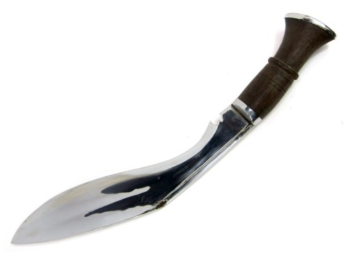 An Indian Kukri, with wooden handle, on curved steel blade, in leather scabbard (AF), length of blade 28cm.