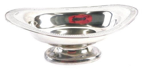 A Victorian silver rosebowl, of oval design with a pierced and crosshatched border, maker D E S E, Sheffield 1894, 13.52oz, 11cm high, 28.5cm wide.