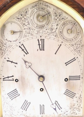 A Victorian gothic bracket clock, the oak case decorated with scrolls, pillars, and leaf carved finials, the arched dial with slow/fast, charm/silent, full chime/Westminster chime subsidiary dials, surrounding a Roman numeric dial with engraved spandrels, - 2