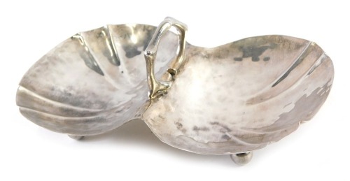 A George V Sir John Bennett of London silver double bonbon dish, with two shell capped bowls and central handle, on bun feet, maker CF, London 1924, 4.88oz.