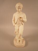 A Victorian Copeland Parian ware figure of a boy with a book standing beside a cricket bat