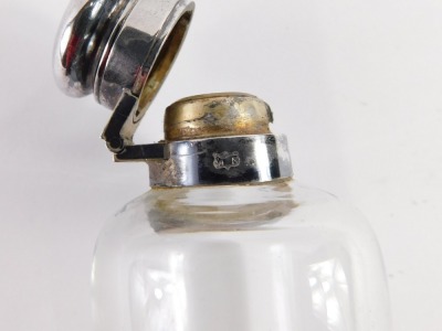 A hip flask, the domed glass body, with a white metal top stamped JD&S Made in England, 25cm high. - 3