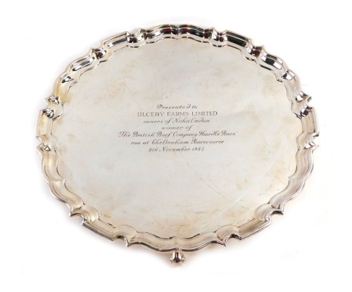 A silver plated Frank Cobb & Co Limited salver, with a piecrust border inscribed Presented to Ulceby Farms Limited Owners of Nohalmdun Winner of the British Beef Company Hurdle Race Run at the Cheltenham Racecourse 8th November 1985, 30cm diameter.