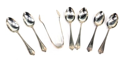 A George V silver spoon and tong set, comprising six teaspoons and set of sugar tongs, each with a tulip bow drop, maker LNS, Birmingham 1926, 2.04oz, in WE Gray of Oxford Street presentation box.