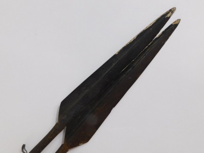 Two tribal spears, with a shaped wooden top, and a silver coloured wire strung handle, 92cm long. (2) - 2