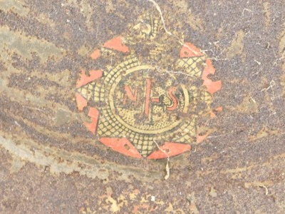 A Fire Service tin hat, with printed emblem (AF). - 2