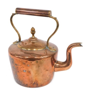 A Victorian copper and brass kettle, 28cm high.