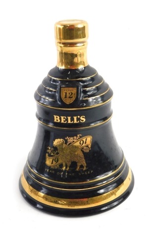 A bottle of Bell's final Scotch whisky celebration decanter for The Year of The Sheep, boxed.