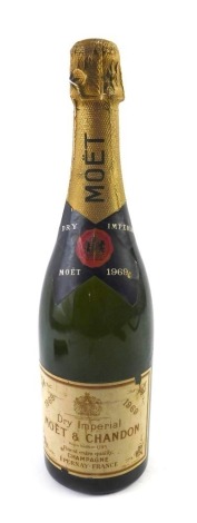 A bottle of Moët & Chandon 1969 Dry Imperial champagne.