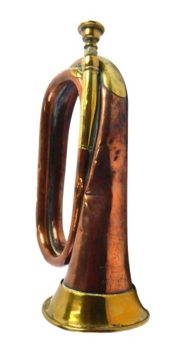 A 19thC brass and copper bugle, 28cm long.