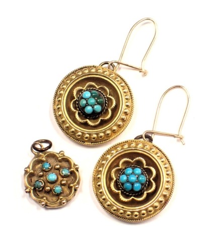 Edwardian jewellery, comprising a pair of bloomed gold and turquoise drop earrings, yellow metal unmarked, the discs 1.5cm wide, the drop 3cm, and an associated pendant set with turquoise with petalated border, 1cm high, 5.3g all in.