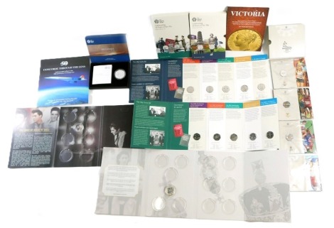 A group of collectors coins, comprising Royal Mint Britannia one ounce silver 2019 uncirculated coin, a Royal Mint Birmingham 2022 Commonwealth Games fifty pence piece coin pack, comprising running and hockey, The British Military set celebrating fifty ye