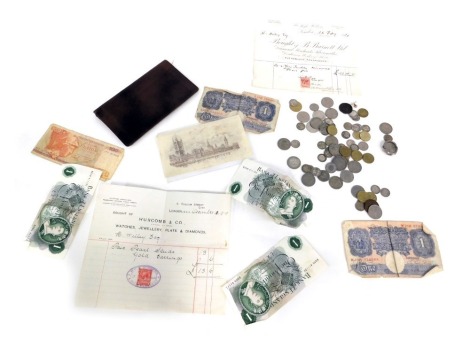 Coins and bank notes, comprising two Bank of England one pound notes, two Bank of England one pound notes with serial number W13H376584, a banknote commemorating The United Kingdom and Ireland Secretary Treasury number 575797, two stamped documents to inc