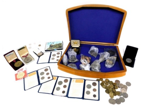 A group of collectors coins, comprising Britain's first decimal coin packs, Sport Relief 2002 medal, a rail building winner medallion, Queen's Golden Jubilee 2002 collectors coin, three pence pieces, fifty pence pieces, Silverstone Home of Motor Racing Gr