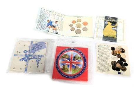 United Kingdom uncirculated coin packs, comprising 1997, 1991, and 1996. (3)