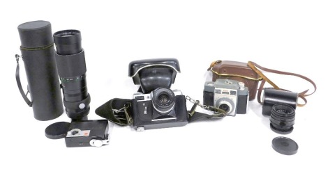 A Prinzflex 500E with solid gold lens, a long lens, etc. WARNING! This lot contains untested or unsafe electrical items. It is supplied for scrap or re-conditioning only. TRADE ONLY