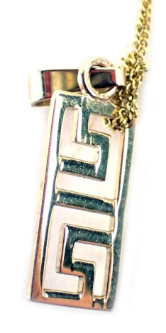 A 9ct gold pendant and chain, the Greek key type pendant on fine link neck chain, 1.4g all in. (AF)