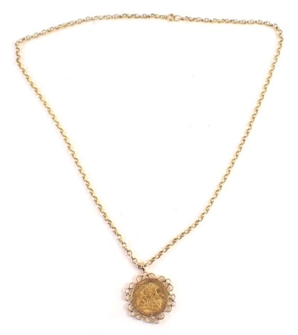 An Edward VII full gold sovereign pendant, dated 1905, in a floral cluster border, stamped 375, on a yellow metal curb link chain, unmarked, the pendant 3cm, the chain 60cm long, 27.1g all in.