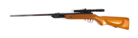 A Hungarian air rifle, .22 calibre, numbered 65142, with telescopic sight and wooden stock, 108cm long.