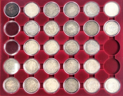 A group of Victorian and later silver coinage, comprising half crowns and crowns, the half crowns dated 1936, 1918 (x4), 1913 (x2), 1977, 1916, 1926, 1916, 1897 (x2), 1912, 1908, 1899, 1893, and others, in presentation case.