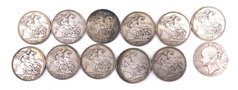 Eleven Victorian silver crowns, each with warrior on horseback, and an earlier Victorian crown dated 1847. (a quantity)