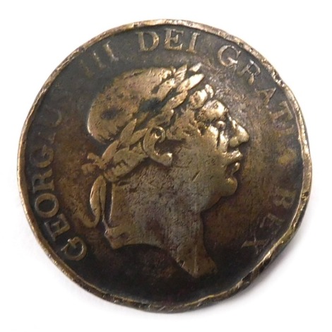 A George III three shilling bank token, dated 1814.