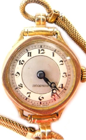 A wristwatch, with gold plated strap and case, with later front and back, yellow metal stamped 9ct, circa 1950s and later. (AF)