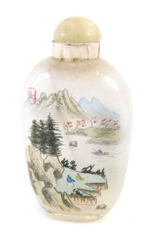 A Chinese glass scent bottle, with painted decoration of mountains and figures, with pale green stopper, 8cm high. (AF)