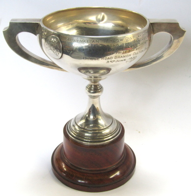  A George V silver trophy cup, the winged handles with applied Australia map, inscribed Australia Window Display Competition, Conducted Among the Branches to the Lowestoft Cooperative Society Ltd, First Prize Won by Bridge Road Branch Oulton Broad, 3rd Ju