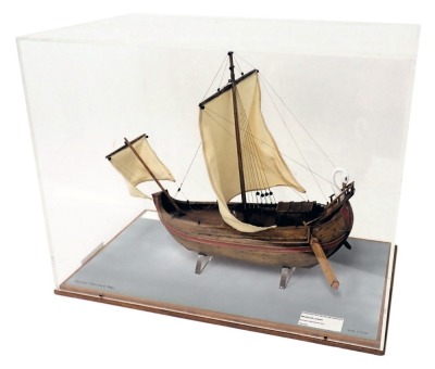 A scale model of a Roman merchant ship, with single mast, swan carved figure head, in perspex case, scale 1:72, 57cm wide.