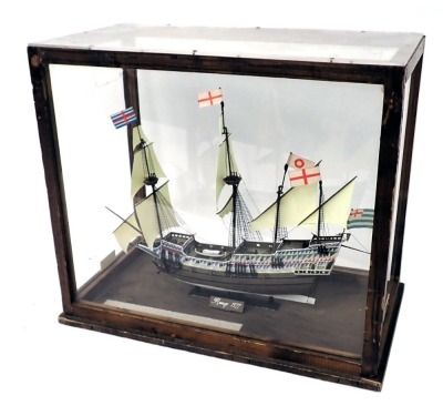 A scale model of Elizabethan galleon The Revenge, polychrome decorated, in stained pine and perspex case, 49cm wide.