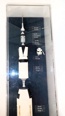 A scale model of Apollo, Saturn, America's Moon Rocket, scale of 1cm:1.44m, polychrome decorated, realistically painted and with lunar module, etc., in perspex case and wooden base, 99cm high overall. - 2