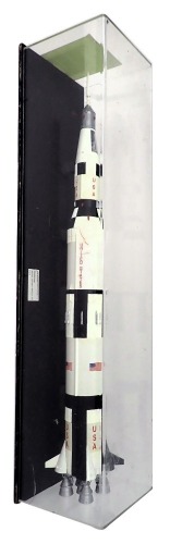 A scale model of the Apollo Saturn V rocket from 1969, realistically decorated and mounted in perspex and ebonised case, 121cm long.