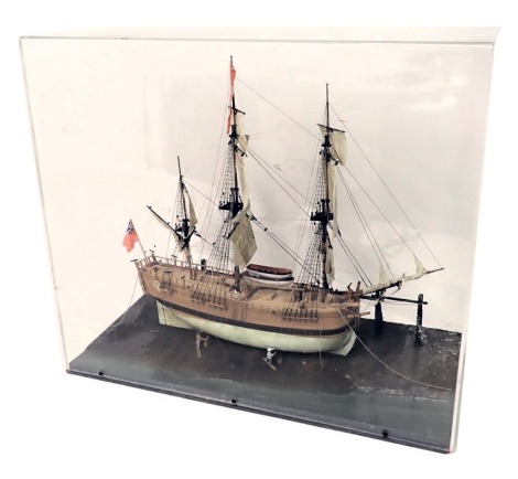 A scale model of Captain Cook's Endeavour, circa 1768, in perspex case, 59cm wide.