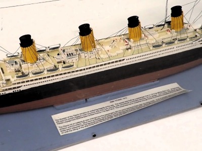 A scale model of the R.M.S Titanic, circa 1912, with four masts, polychrome decorated, in perspex case, 91cm wide. - 2