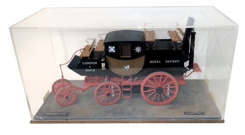 A scale model of a Gurney's steam carriage, 1:12cm, with livery for London and Bath, Royal Patent, in perspex case, 62cm wide.