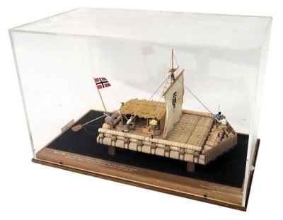 A scale model of the Kontiki Raft of Thor Heyedahl, 1cm:40cm, in perspex and wooden case, 49cm wide.